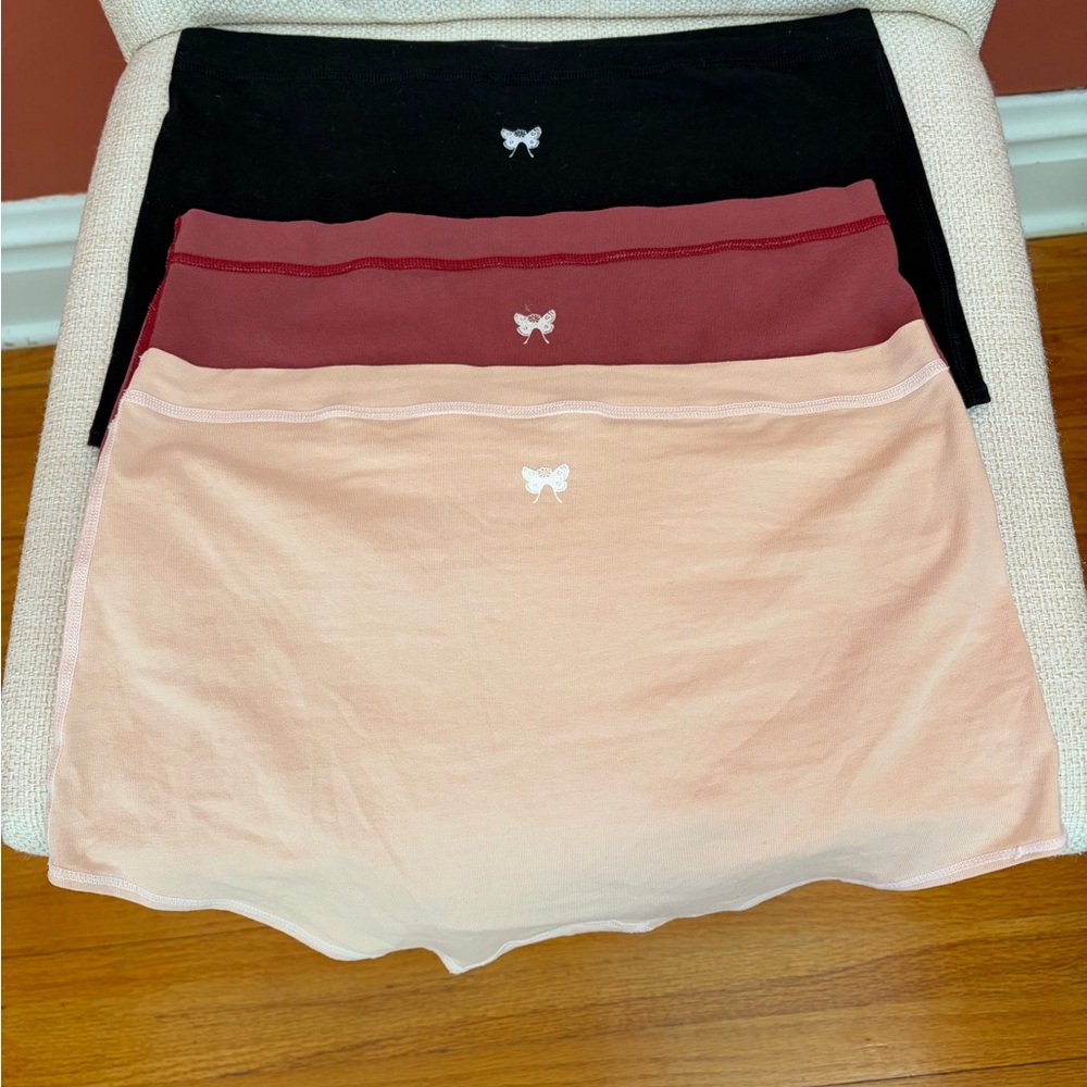 Purusha People set of apricot, garnet, and black daily brief underwear